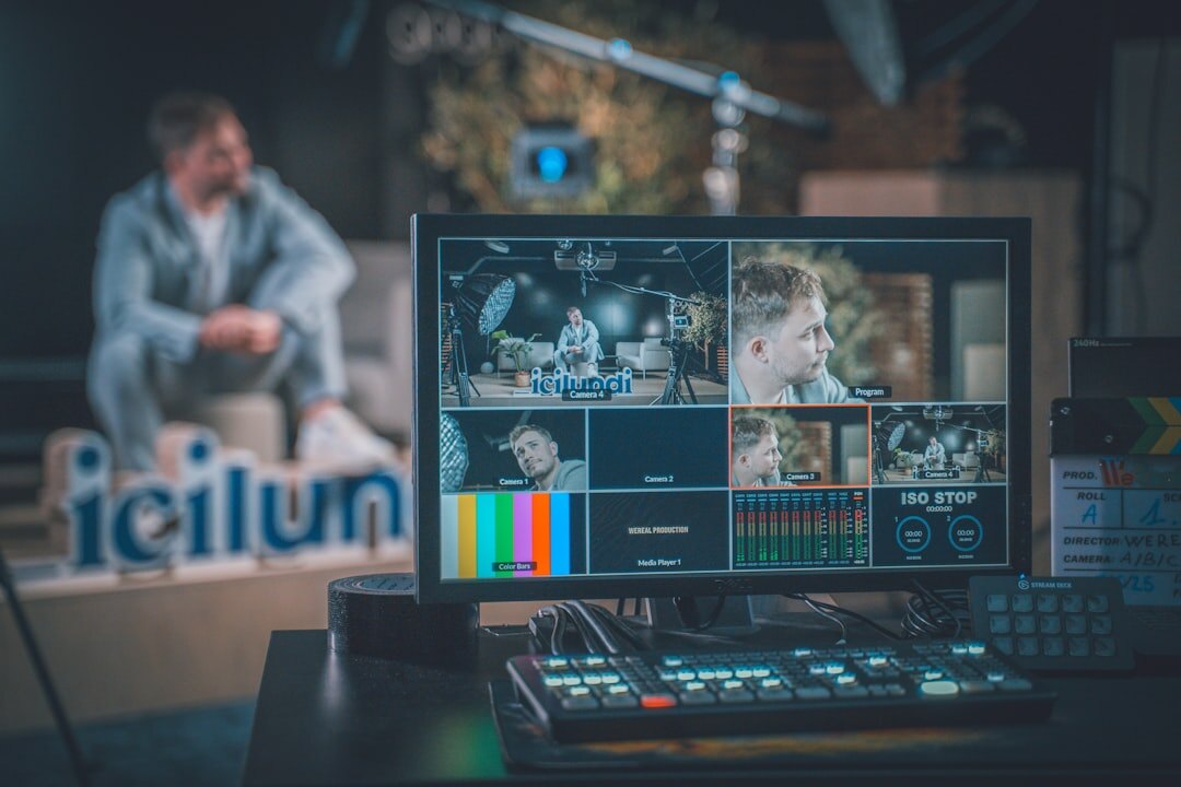 Video editor working on multiple monitors with editing timeline software